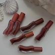 لیپ گلاس گیسو شکلاتی اولیبولا Olibolla Honey Infused Glossy Plump Lip Oil 