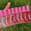 لیپ گلاس گیسو شاین دار اولیبولا Olibolla Honey Infused Glossy Plump Lip Oil 