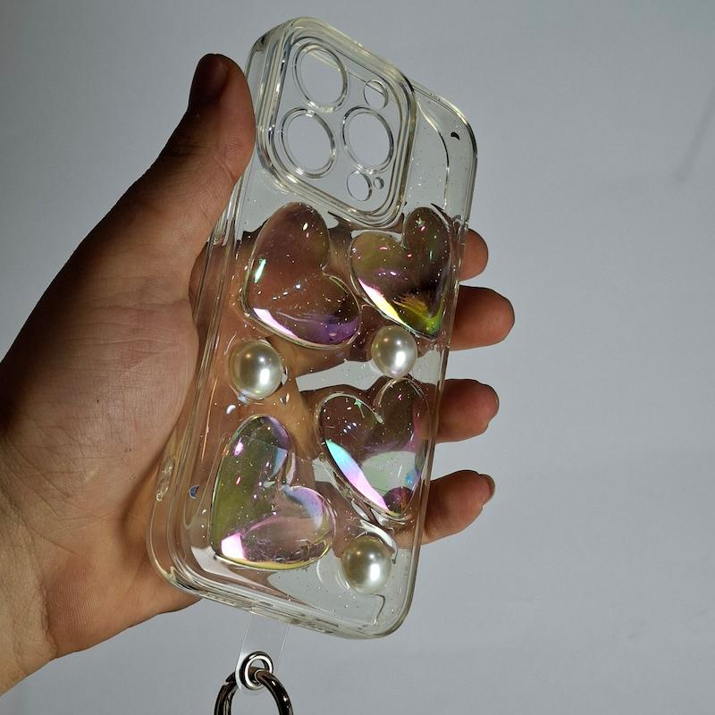 کاور IPhone 15 Pro قلبی هولوگرامی با آویز اپل آیفون ۱۵ پرو