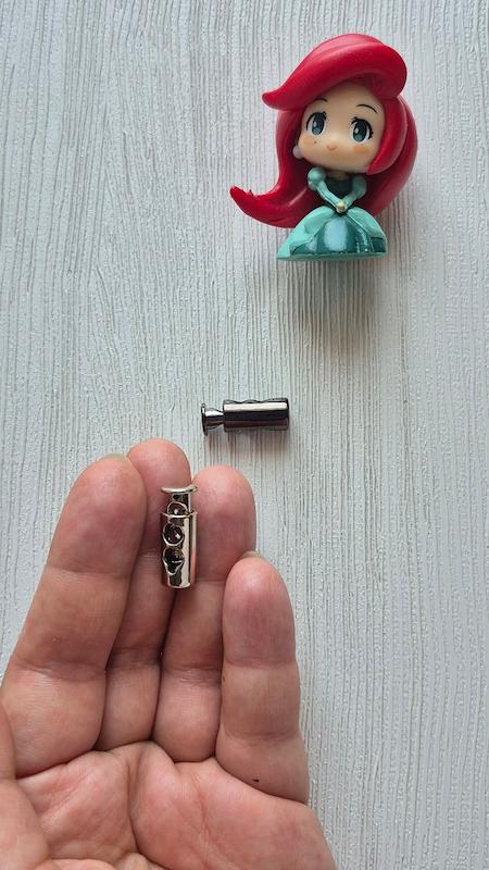 استوپر پلاستیکی (سرمنگوله فنردار) مدل استوانه ای کرمی و نقره ای