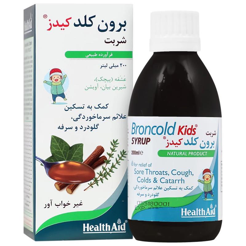 جعبه و بطری شربت برونکلد کیدز هلث اید ۱۵۰ میلی لیتر داروی گیاهی ضد سرفه خلط آور و نرم کننده گلو کودکان حاوی عشقه ختمی آویشن عسل و ویتامین سی - تیدارو