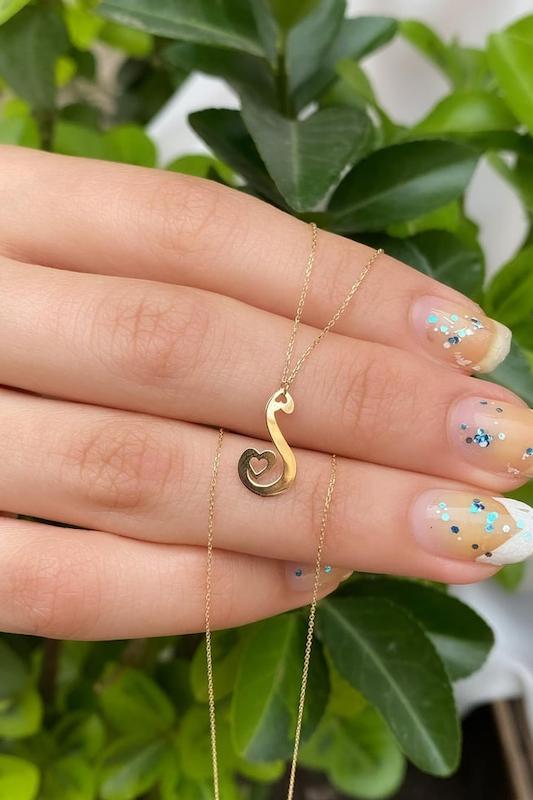 آویز طلا قلب قو نت عشق