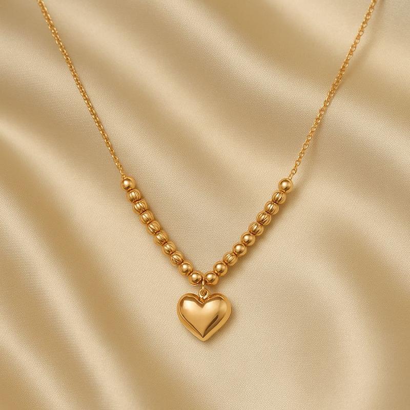 گردنبند طلای قلبی گوی – زیبایی و عشق در یک طراحی