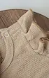 نمای نزدیک رامپر پفکی با دوخت تمیز