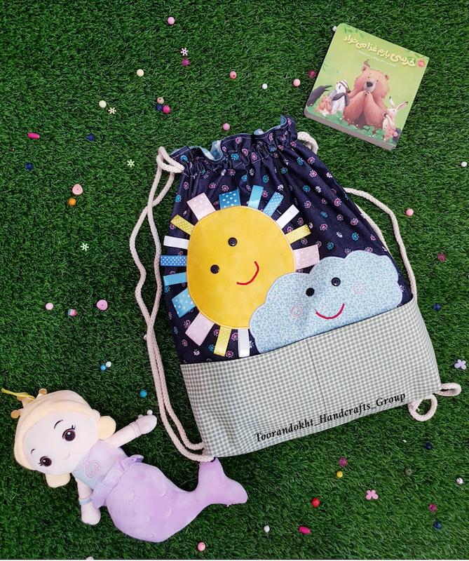 کوله کودک طرح خورشید و ابر