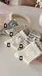 جوراب نخی زنانه ساقدار طرح عروسکی 