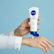 کرم جوانساز دست نیوا Nivea 3 in 1 Anti-Age Q10 Hand Cream سه کاره Q10 حجم 75 میل