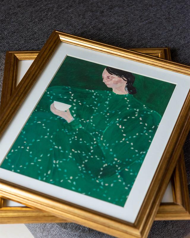 girl in green gold frame