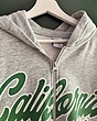 سوییشرت اورسایز تو کرکی طوسی ملانژ california برند Bershka