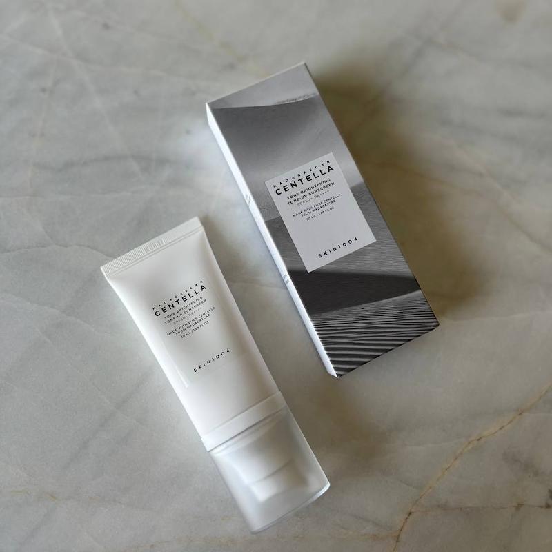 کرم ضد آفتاب روشن کننده تون آپ سنتلا اسکین 1004