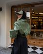 YOLO green jacket