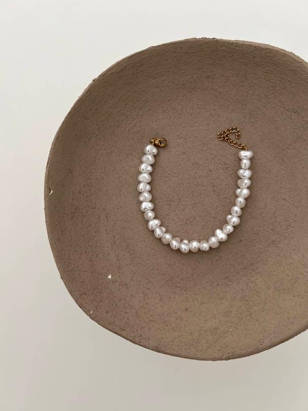 دستبند مروارید دفرمه جدید