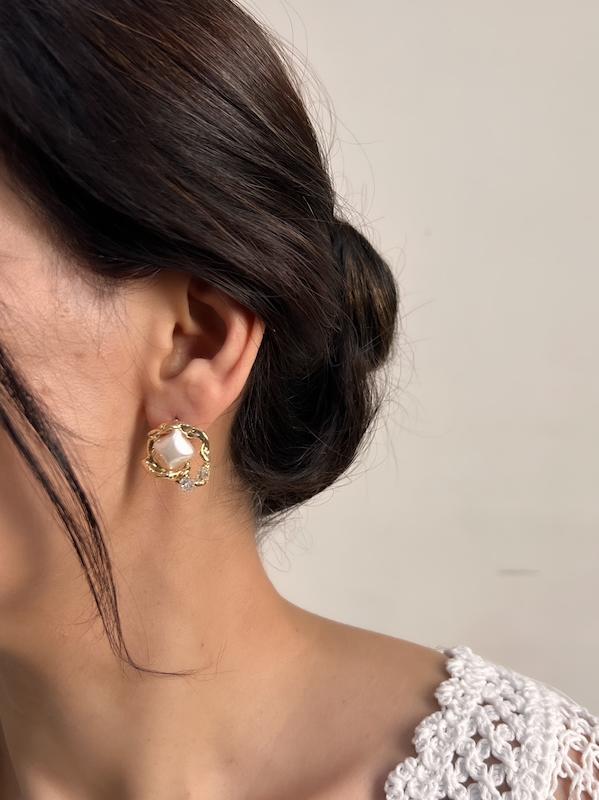 گوشواره مرواریدی دفرمه