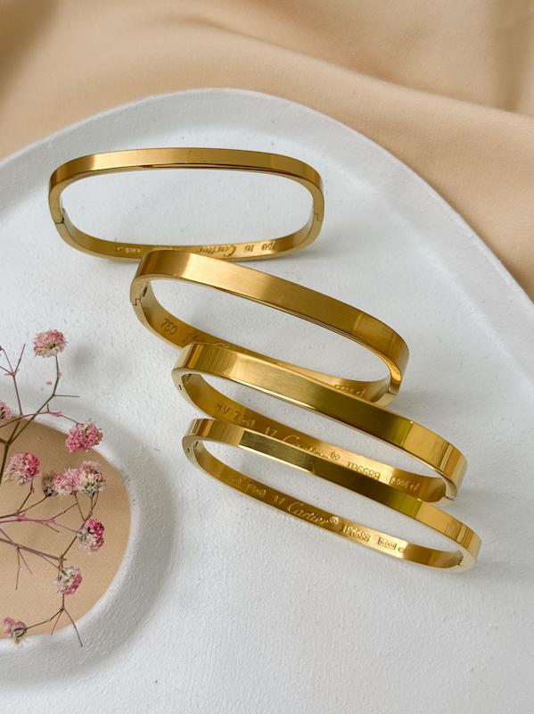 دستبند استیل النگویی مربعی کارتیر ( سری طلایی )