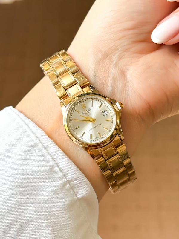 ساعت زنانه کاسیو طلایی صفحه نقره ای  Casio MTP-1199