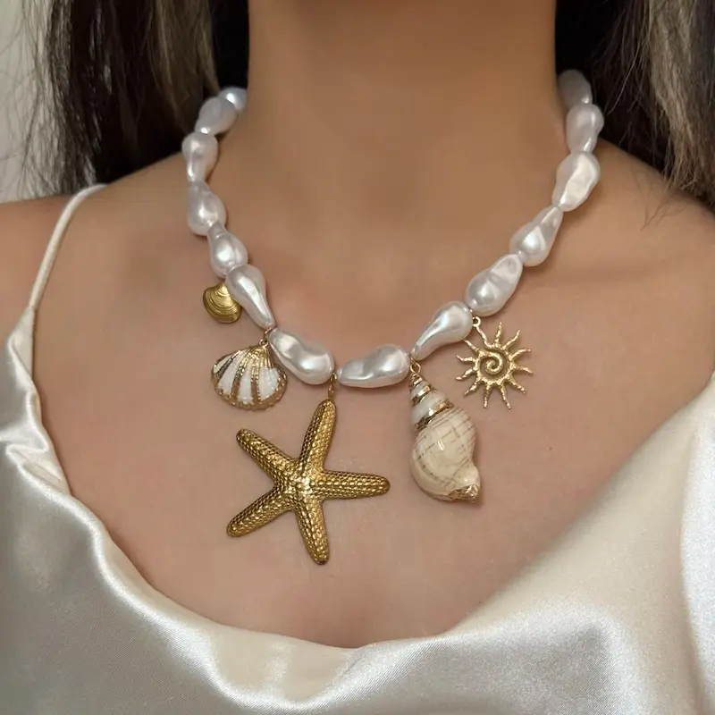 گردنبند مرواریدی چارم ستاره و صدف