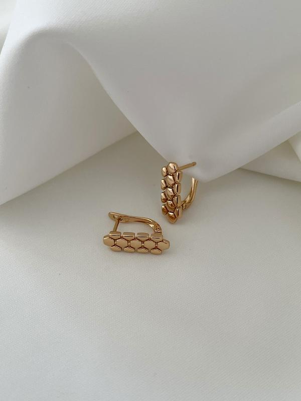گوشواره پوست ماری ژوپینگ