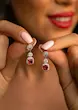 گوشواره نقره زنانه نگین سبز سلطنتی طرح اشرافی – عیار 925